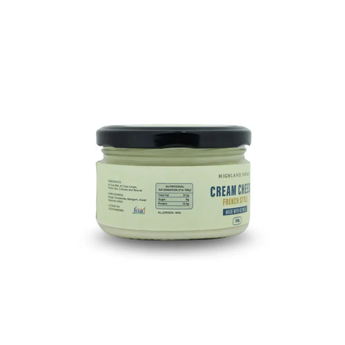 Back label of A2 cream cheese showing FSSAI license ingredients and manufacturing details Highland Farm