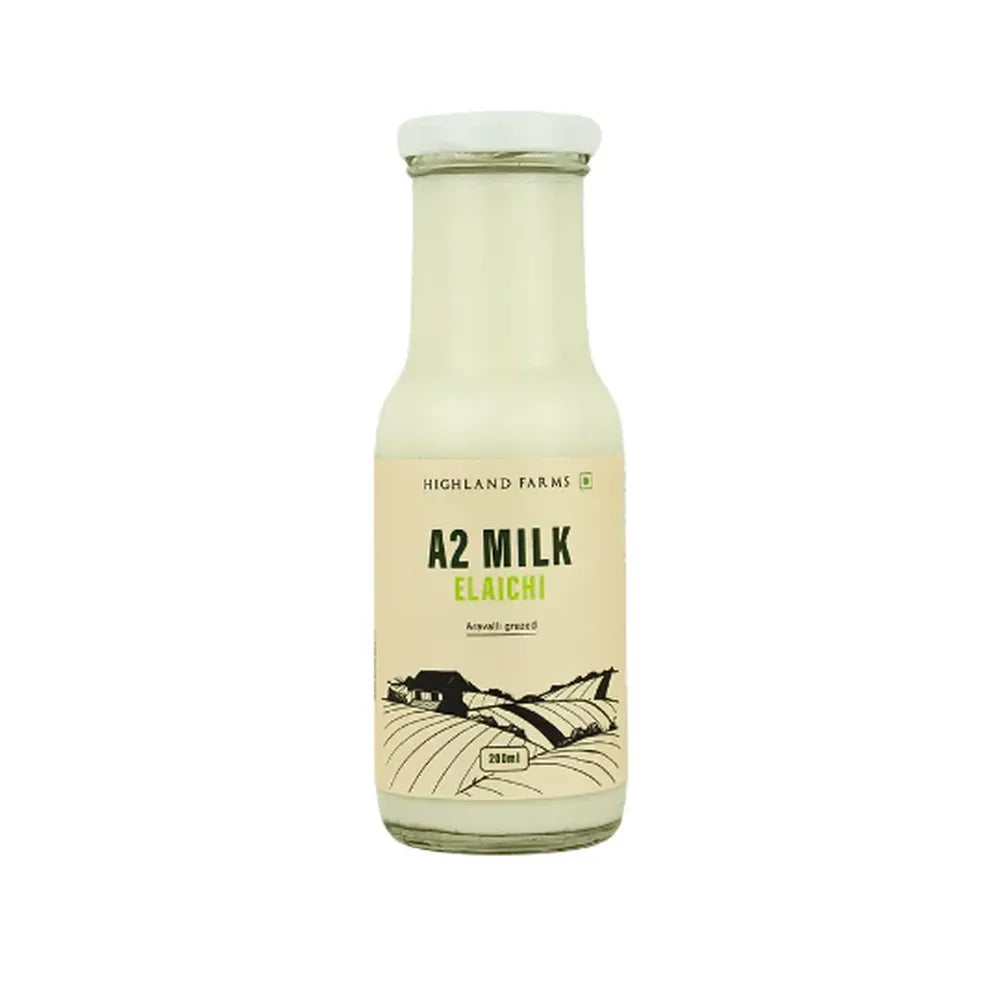 Highland Farms A2 elaichi flavored milk in glass bottle made from desi cow milk, natural and preservative free