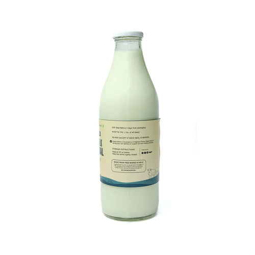 Back label of A2 milk bottle showing storage and delivery details Highland Farms daily milk subscription Delhi NCR