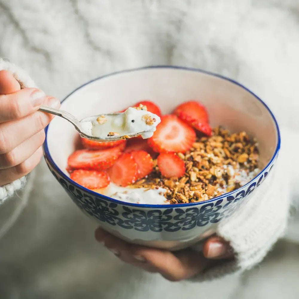 A2 natural yogurt breakfast bowl with fruits and granola healthy probiotic snack