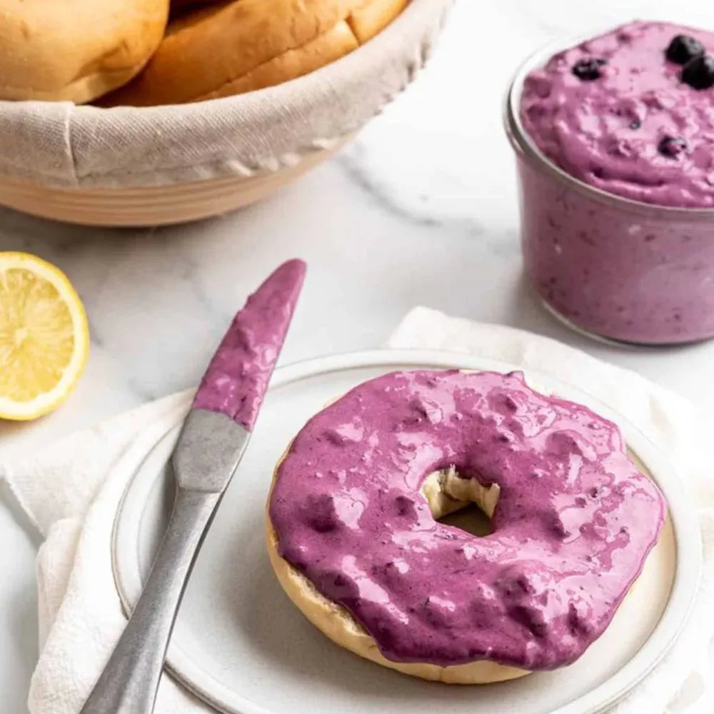 Blueberry cream cheese spread on bagel with knife sweet breakfast spread made from A2 milk Delhi NCR