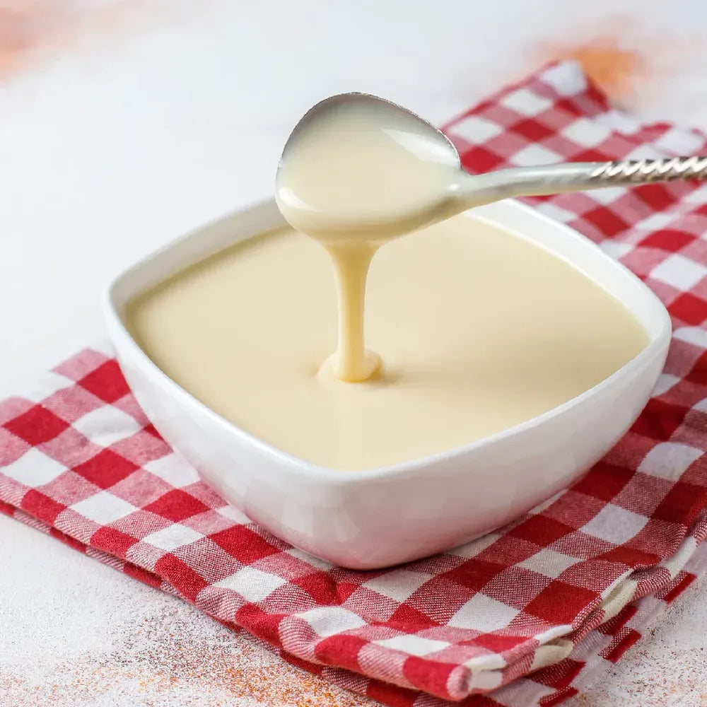 Thick creamy condensed milk texture smooth sweet milk for desserts and toppings