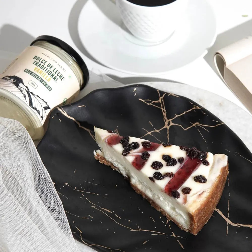 dulce de leche vanilla used as dessert topping on cheesecake made from A2 cow milk rich creamy flavor