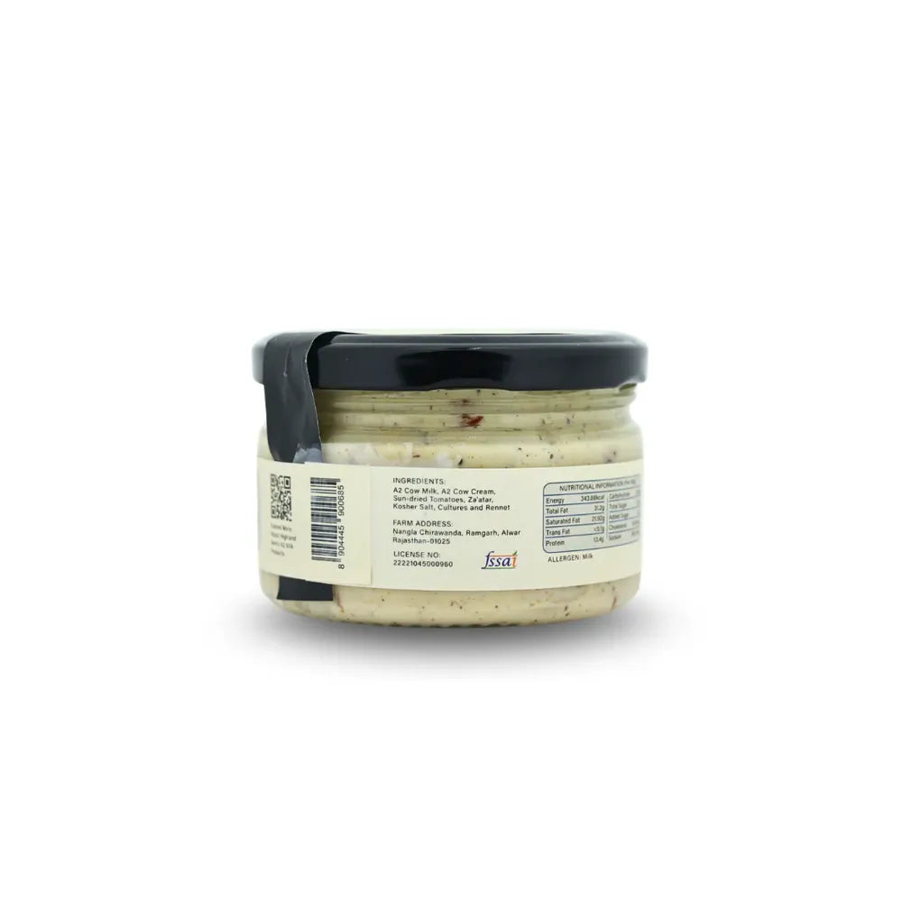 Back label of sun dried tomato A2 cream cheese showing ingredients FSSAI and manufacturing details Highland Farms