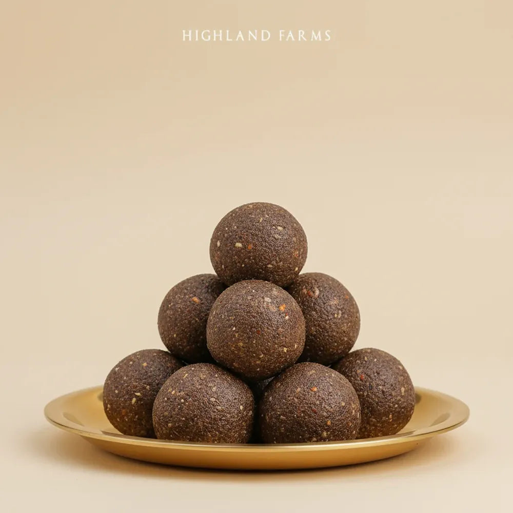 Ragi laddu millet pinni served on plate healthy traditional sweet rich in calcium and fiber