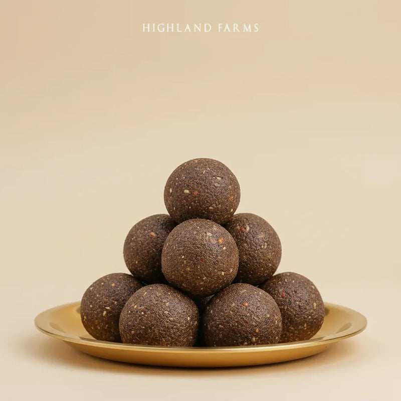 Ragi laddu millet pinni served on plate healthy traditional sweet rich in calcium and fiber