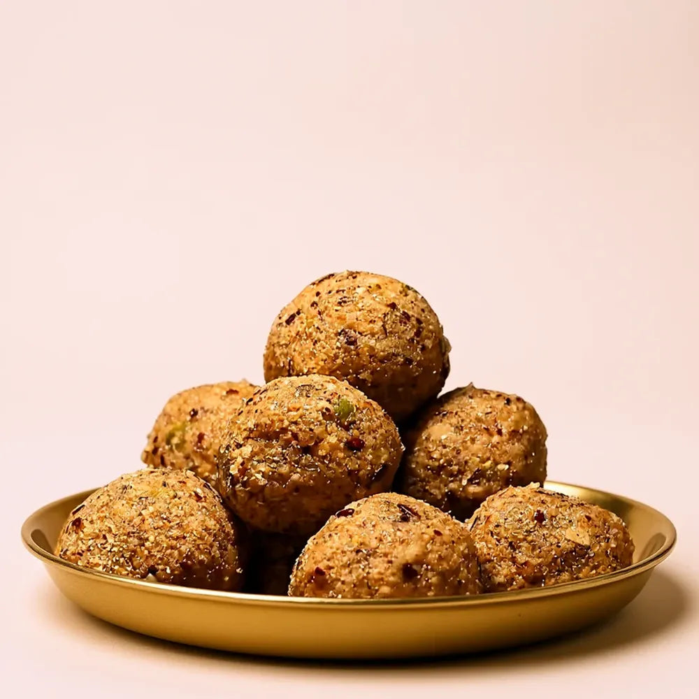 Panjiri laddu close up made with dry fruits and A2 ghee nutritious energy balls Indian sweet