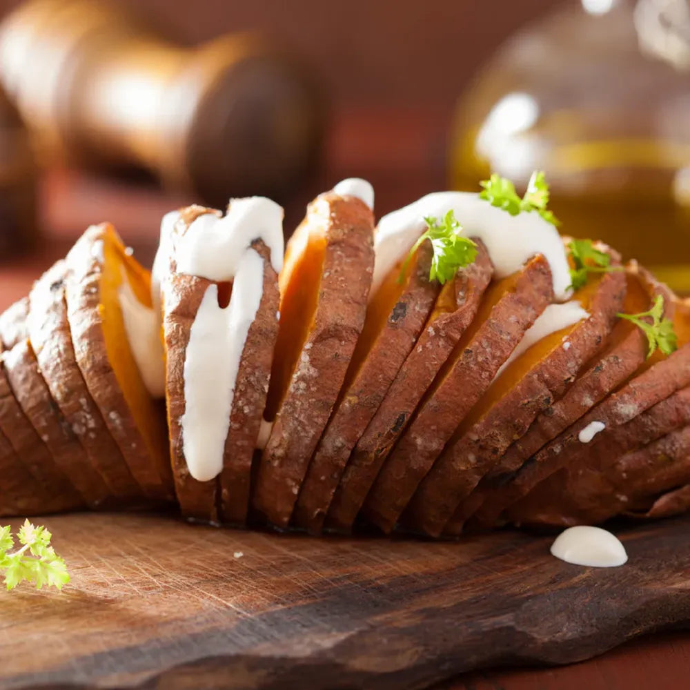 Fresh sour cream used as dip with roasted potatoes and bread creamy texture Highland Farms
